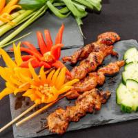 1 Skewer · Family recipes marinated lemongrass meats are smashed onto skewers and grilled to juicy perf...
