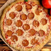 Pepperoni Pizza · Spelt Crust, Roasted Basil Pizza Sauce, Vegan Mozzarella Cheese & Pepperoni(Seitan).