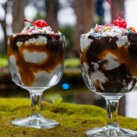 Hot Fudge Sundae · edy's vanilla ice cream, sprinkles, hot fudge, cherry, whipped cream