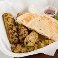 Chicken Shish Kabab (4 Pcs) With One Paratha · Ground chicken with different kind of spices and herbs with Naan Bread