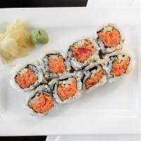 Hana Roll · Snow crab and crunchy flake inside, topped with tuna, salmon and eel.