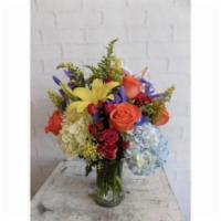 Market Garden · A blooming show is on display! Our designers have taken seasonal blooms, such as hydrangea, ...