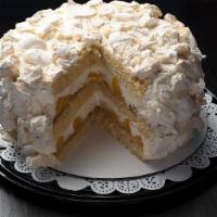 (202) Chaja · Dessert with cream, peach, “dulce de leche” and meringue.