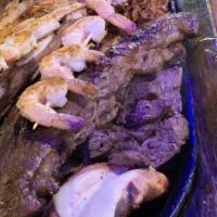 Parrillada Mixta · Shrimp, Chicken, and choice of grilled steak: Outside skirt steak, beef short ribs, Rib eye,...