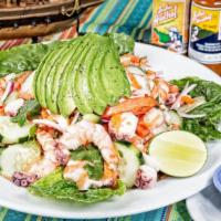 Order Of Ceviche Mixto · Shrimp, Octupus, imitation crab meat, tomatoes, and avocado. All cooked in fresh lime (porti...