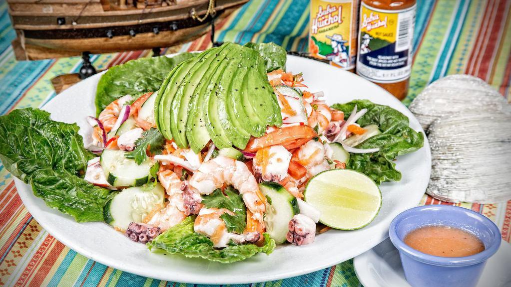 Order Of Ceviche Mixto · Shrimp, Octupus, imitation crab meat, tomatoes, and avocado. All cooked in fresh lime (portion for 2)