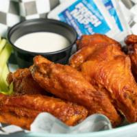 Buffalo Wings · Meaty wings with our homemade Buffalo Sauce served with dippings sauce and celery