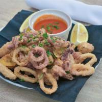 Calamari · Crispy calamari and zucchini with arrabbiata sauce.