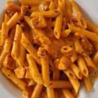 Penne Salmone · Penne with smoked salmon and cream sauce.