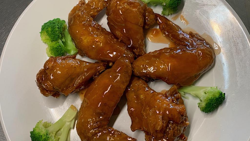 6 Pieces Chicken Wings · Hot and spicy.