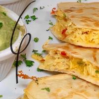 Quesadillas De Pollo · Shaved chicken, fresh vegetables and mixed cheese in a grilled flour tortilla with pico de g...