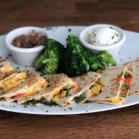 Ouesadilla De Vegetales · Fresh vegetables, sautéed onions, peppers, mushrooms, tomatoes, broccoli, mixed cheese in a ...