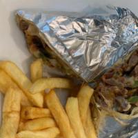 Philly Cheesesteak  Wrap French Fries & Soda · Mozzarella cheese,red onions,mushrooms,green peppers , french fries & soda