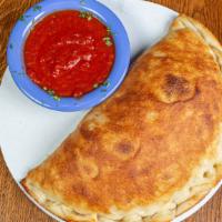 Cheese Calzone · Mozzarella & ricotta cheese with homemade pizza sauce on the side.
