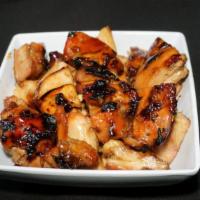 Bourbon Chicken · Our signature dish, grilled chopped marinated chicken served with our
homemade bourbon sauce.