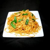 Vegetable Lo Mein · Lo mein is prepared with our egg noodles tossed in the wok with onions, cabbage, carrots, gr...