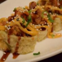 Stone Mountain Roll  · Crab, shrimp, avocado & jalapeno lightly fried. Top with spicy crunch tuna, puffed rice & sc...