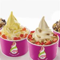 Family Pack · 4 Small Frozen Yogurt Cups + 8 Toppings.