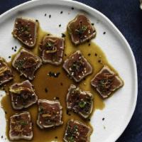 Yellowfin / Big Eye Tuna Tataki · scallions, sesame seeds, crispy leeks - house ponzu