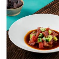 Tuna Nikkei Ceviche · yellowfin tuna, avocado, sesame-ginger ponzu, black quinoa pop