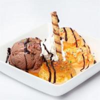 Copa Lolita · Two ice cream choices, with our delicious flan.
