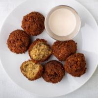 Falafel · Fried ground chickpea balls mixed with our special blend of herbs. Large comes with 2 pieces...
