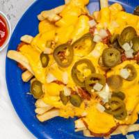 Deluxe Fries · Crispy seasoned fries with Unlimited Toppings