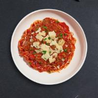 Saucy S&M Pasta · Fresh spaghetti and homemade ground beef served with rossa (red) sauce, red pepper flakes, a...