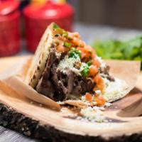 Grill Angus Beef · Arepa Rellena con carne de Angus al Grill rebanada finamente, Pico de Gallo, Salsa y Queso r...