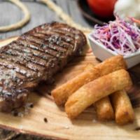 New York Steak · Tender New York Steak 8 oz. Cut served with your choice of  two Sides