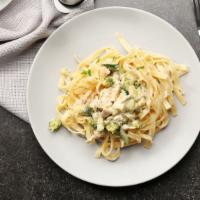 Fettuccine Alfredo · Al dente fettuccine with our rich, creamy, Alfredo sauce and your choice of tender grilled c...