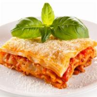 Lasagna · Hearty, homemade, traditional lasagna layered with sheet noodles, our marinara sauce, Italia...