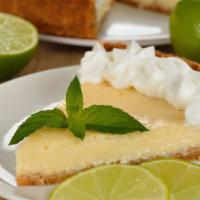 Key Lime Pie · Sweet and refreshingly tart lime custard, with a graham cracker crust and topped with mering...