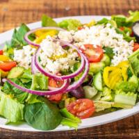 Greek Salad · Served with pita and Greek dressing. Lettuce, tomatoes, cucumbers, onions, banana peppers, p...