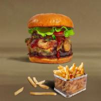 Bbq Trails Burger · American beef patty topped with melted cheese, barbecue sauce, lettuce, tomato, onion, and p...