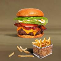 Break Of Dawn Burger · American beef patty topped with bacon, fried egg, avocado, melted cheese, lettuce, tomato, o...