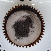 Cookies & Cream Cupcake · Chocolate cupcake topped with a cookies and cream buttercream and garnished with Oreo crumbl...