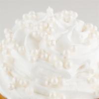 Wedding Cake Cupcake · Signature almond cake topped with almond buttercream and candy pearls!.