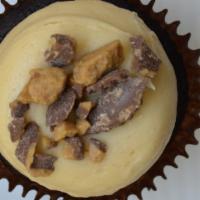 Peanut Butter Cup Cupcake · Favorite. Chocolate cake topped with peanut butter cream cheese and garnished with chocolate...
