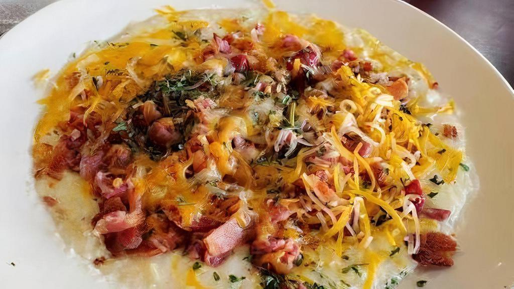 Breakfast Bowl · Grits, Eggs, Choice of Meat (Bacon, Turkey Bacon (additional charge), Beef Sausage, or Pork Sausage) please specify
