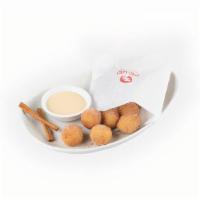 Thai Donuts · Scratch-made donuts freshly fried to order and tossed with Saigon cinnamon and cane sugar. S...