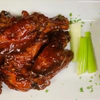 Wings · 10 wings served with blue cheese dressing and celery tossed with your choice of buffalo, hon...