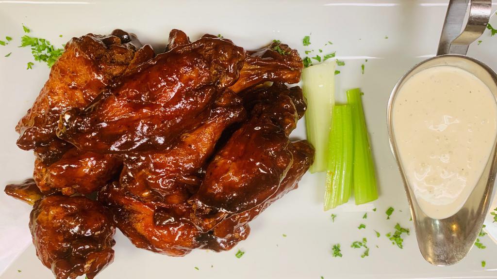 Wings · 10 wings served with blue cheese dressing and celery tossed with your choice of buffalo, honey garlic, or BBQ sauce.