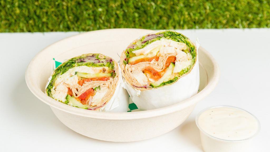 Mediterranean Wrap · Most popular. Grilled chicken, romaine lettuce, tomatoes, green and red bell peppers, cucumbers, red onions and hummus with balsamic dressing. Served on your choice of tortilla.