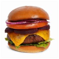 The Australian Burger · Beef patty with crisp bacon, lettuce, tomato, onion, shaved red beets, mayo, and melted ched...