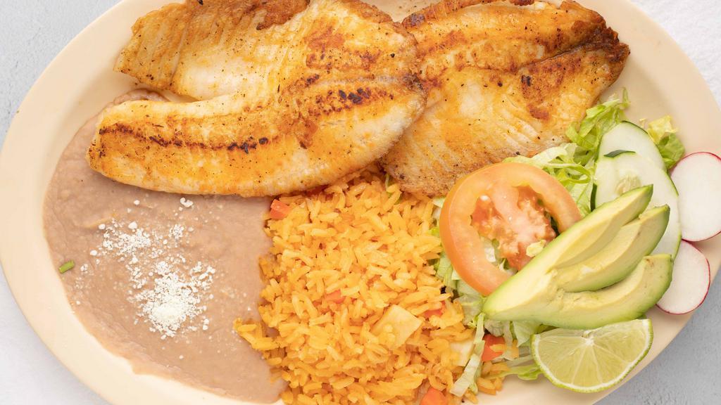 Filete Al Ajillo · Fish fillet prepared in garlic sauce. Served with rice, salad and french fries.