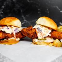 Nashville Style Hot Chicken Sandwich · Nashville style hot chicken sandwich made with a jumbo, buttermilk herb marinated, double ha...