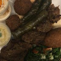 Combo 2 · One shawarma (beef, chicken, or mixed), one kibbe, and tabouli salad.