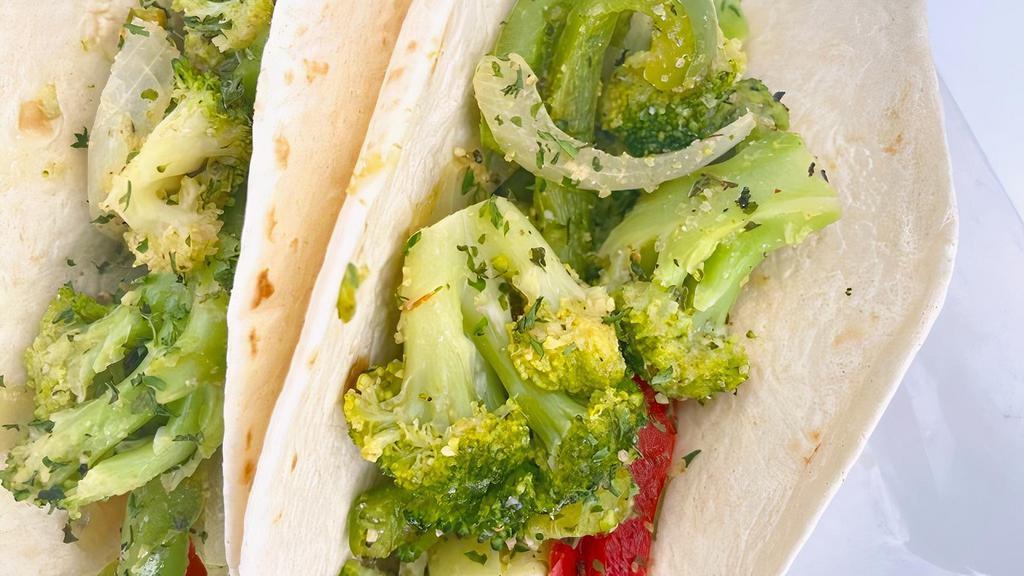 Veggie Tacos · Sauteed Broccoli, Peppers & Onions.
3 Tacos.