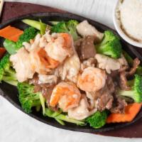 Triple Delight 炒三样 · Shredded chicken, beef, and shrimp with fresh vegetables. Served With white rice. With brown...